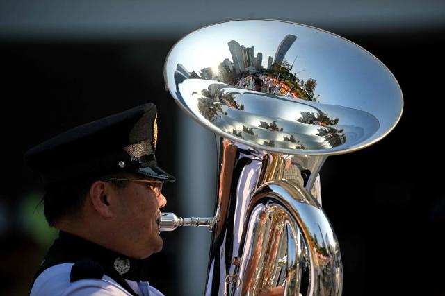 A Hong Kong police band member takes part in a ceremony held to mark the opening of the legal year in Hong Kong on January 19, 2026. (Photo by Peter PARKS / AFP)