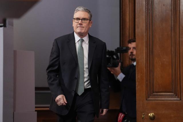 Britain's Prime Minister Keir Starmer arrives to deliver a statement in the media briefing room at 9 Downing Street in central London on January 19, 2026. Starmer said a trade war over Greenland is 'in no one's interest'. (Photo by Jordan Pettitt / POOL / AFP)
