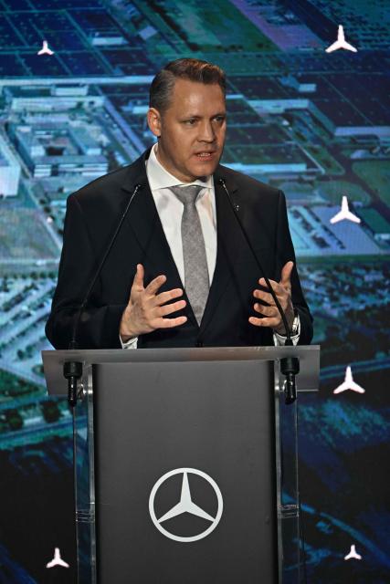 Managing Director of Mercedes Benz Manufacturing Hungary Jens Buhler gives a speech during the launch ceremony of the Mercedes Benz GLB type series production at the plant in  Kecskemet, Hungary on January 19, 2026. (Photo by Attila KISBENEDEK / AFP)