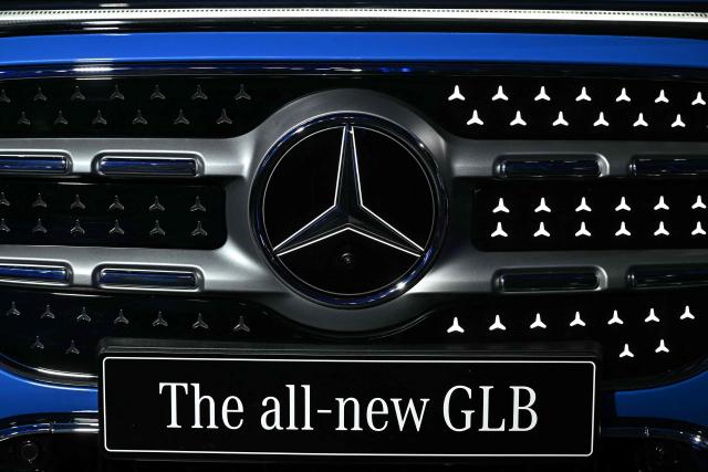 The logo of a Mercedes Benz GLB type is seen during the launch of its series production at the plant in  Kecskemet, Hungary on January 19, 2026. (Photo by Attila KISBENEDEK / AFP)