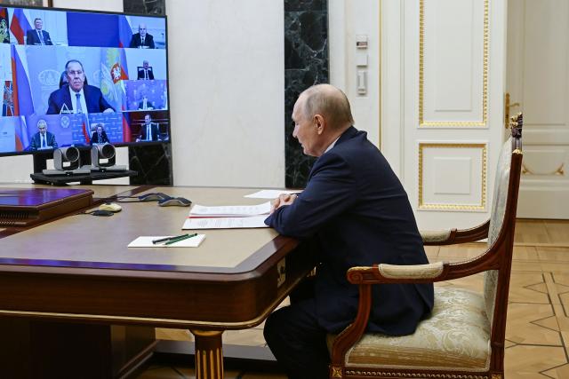 In this pool photograph distributed by the Russian state agency Sputnik, Russia's President Vladimir Putin chairs a Security Council meeting via videolink in Moscow on January 19, 2026. (Photo by ALEXEY BABUSHKIN / POOL / AFP)