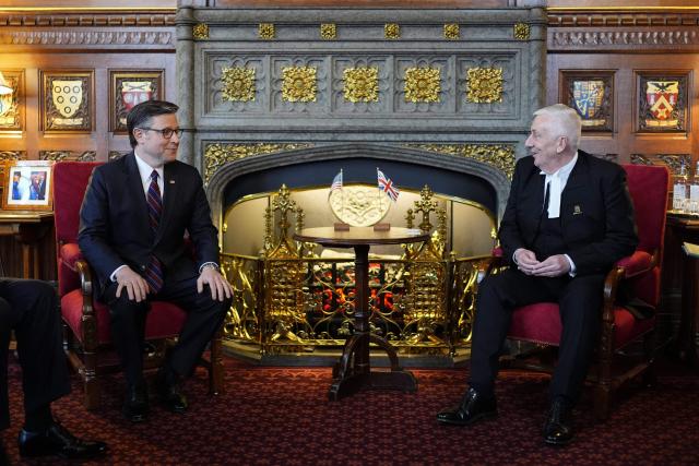Britain's Speaker of the House of Commons Lindsay Hoyle (R) speaks with US House Speaker Mike Johnson (L) during his visit to the House of Commons in central London on January 19, 2026. (Photo by Jordan Pettitt / POOL / AFP)