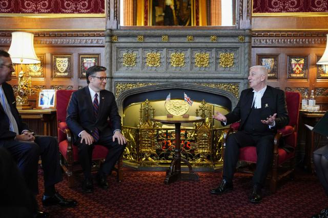 Britain's Speaker of the House of Commons Lindsay Hoyle (R) speaks with US House Speaker Mike Johnson (L) during his visit to the House of Commons in central London on January 19, 2026. (Photo by Jordan Pettitt / POOL / AFP)