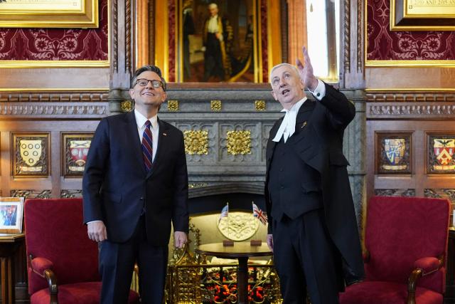 Britain's Speaker of the House of Commons Lindsay Hoyle (R) gestures as he speaks with US House Speaker Mike Johnson (L) during his visit to the House of Commons in central London on January 19, 2026. (Photo by Jordan Pettitt / POOL / AFP)