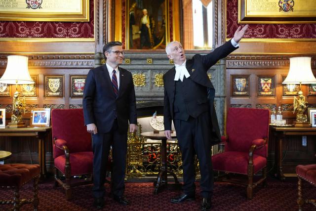 Britain's Speaker of the House of Commons Lindsay Hoyle (R) gestures as he speaks with US House Speaker Mike Johnson (L) during his visit to the House of Commons in central London on January 19, 2026. (Photo by Jordan Pettitt / POOL / AFP)