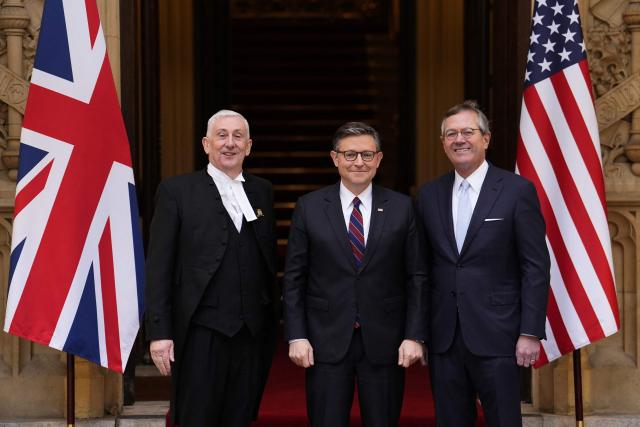 Britain's Speaker of the House of Commons Lindsay Hoyle (L) poses with US House Speaker Mike Johnson (C) and US ambassador to the UK, Warren Stephens (R), during a visit to the House of Commons in central London on January 19, 2026. (Photo by Jordan Pettitt / POOL / AFP)