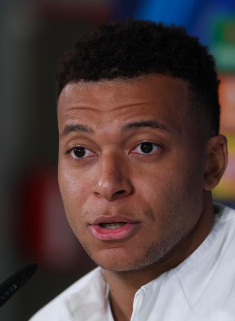 Real Madrid's French forward #10 Kylian Mbappe attends a press conference on the eve of the UEFA Champions League league phase day 7 football match between Real Madrid CF and AS Monaco at Real Madrid Sports City in Valdebebas, on the outskirts of Madrid, on January 19, 2026. (Photo by Pierre-Philippe MARCOU / AFP)