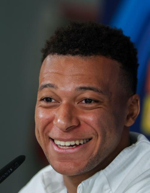 Real Madrid's French forward #10 Kylian Mbappe smiles during a press conference on the eve of the UEFA Champions League league phase day 7 football match between Real Madrid CF and AS Monaco at Real Madrid Sports City in Valdebebas, on the outskirts of Madrid, on January 19, 2026. (Photo by Pierre-Philippe MARCOU / AFP)