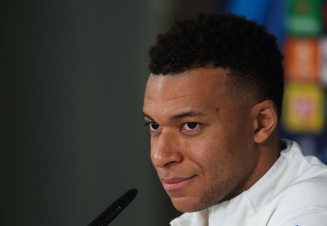 Real Madrid's French forward #10 Kylian Mbappe attends a press conference on the eve of the UEFA Champions League league phase day 7 football match between Real Madrid CF and AS Monaco at Real Madrid Sports City in Valdebebas, on the outskirts of Madrid, on January 19, 2026. (Photo by Pierre-Philippe MARCOU / AFP)
