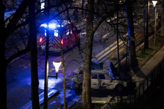 A photo shows a burnt-out car following incidents during celebrations after the Africa Cup of Nations (CAN) football final, in the 18th arrondissement of Paris on January 19, 2026. (Photo by JOEL SAGET / AFP)
