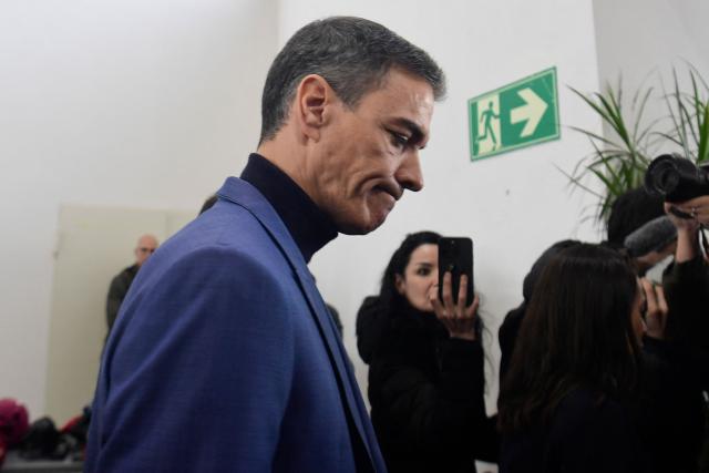 Spain's Prime Minister Pedro Sanchez leaves a press conference following a deadly train accident in Adamuz, southern Spain, on January 19, 2026. At least 39 people died and more than 120 injured in the deadliest train accident in Spain in over a decade.
The crash happened on Sunday evening when a train operated by rail company Iryo travelling from Malaga to Madrid derailed near Adamuz, crossing onto the other track where it crashed into an oncoming train, which also derailed. (Photo by CRISTINA QUICLER / AFP)