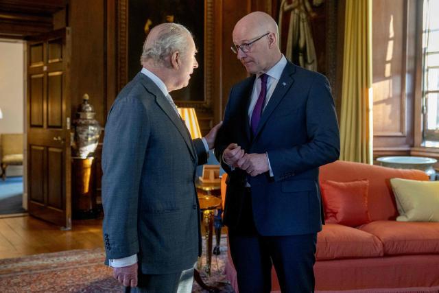 King Charles Britain's King Charles III meets the First Minister of Scotland John Swinney during a reception at the Palace of Holyroodhouse, Edinburgh, on January 19, 2026, to mark the Scotland Investment Forum. (Photo by Jane Barlow / POOL / AFP)