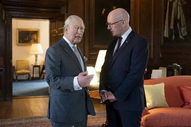 King Charles Britain's King Charles III meets the First Minister of Scotland John Swinney during a reception at the Palace of Holyroodhouse, Edinburgh, on January 19, 2026, to mark the Scotland Investment Forum. (Photo by Jane Barlow / POOL / AFP)