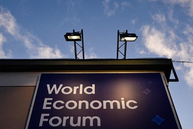 This photograph shows a placard reading "World Economic Forum" during the World Economic Forum (WEF) annual meeting in Davos on January 19, 2026. The World Economic Forum takes place in Davos from January 19 to January 23, 2026. (Photo by INA FASSBENDER / AFP)