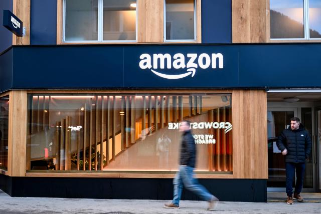 This photograph shows the Amazon's booth during the World Economic Forum (WEF) annual meeting in Davos on January 19, 2026. The World Economic Forum takes place in Davos from January 19 to January 23, 2026. (Photo by INA FASSBENDER / AFP)