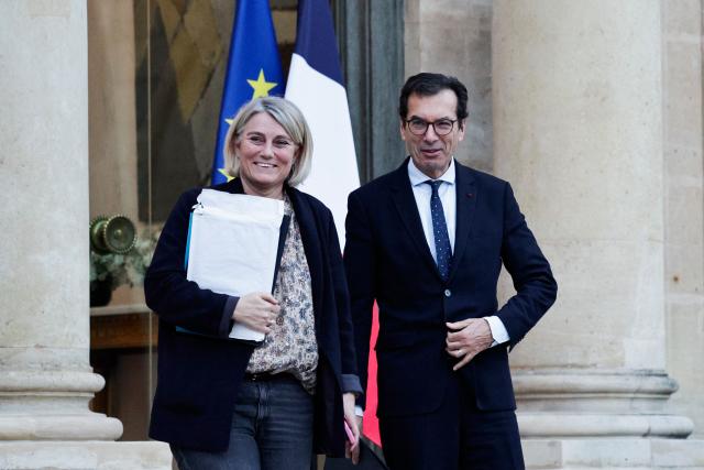 France's Health Minister Stephanie Rist and France's Labour Minister Jean-Pierre Farandou leave after the cabinet meeting in Paris on January 19, 2026. (Photo by STEPHANE DE SAKUTIN / AFP)