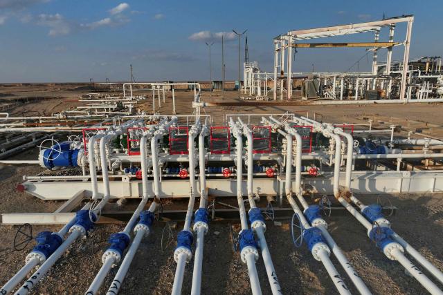 An areal photograph shows part of the Al-Omar oil field in Syria’s eastern Deir Ezzor province on January 19, 2026. Syria's army deployed in formerly Kurdish-led areas in the country's east and north on January 19, after a ceasefire announced a day earlier. The Kurdish-led Syrian Democratic Forces (SDF) on January 18, withdrew from areas under its control in the eastern Deir Ezzor countryside, including the Al-Omar oil field. (Photo by Omar HAJ KADOUR / AFP)