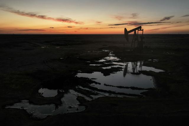 An areal photograph shows part of the Al-Omar oil field in Syria’s eastern Deir Ezzor province at sunset on January 19, 2026. Syria's army deployed in formerly Kurdish-led areas in the country's east and north on January 19, after a ceasefire announced a day earlier. The Kurdish-led Syrian Democratic Forces (SDF) on January 18, withdrew from areas under its control in the eastern Deir Ezzor countryside, including the Al-Omar oil field. (Photo by Omar HAJ KADOUR / AFP)