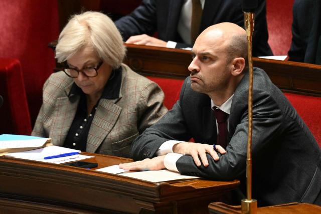 France's Defence Minister Catherine Vautrin (L) and France's Foreign Affairs Minister Jean-Noel Barrot attend a debate on France's role in preventing and resolving international political crises, particularly in Venezuela at the National Assembly in Paris, on January 19, 2026. (Photo by Bertrand GUAY / AFP)