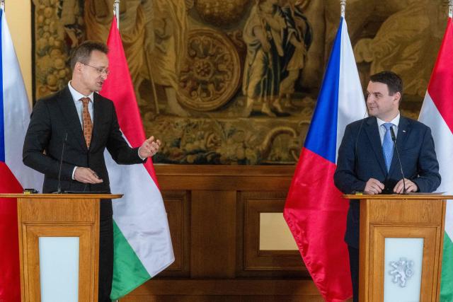 Czech Foreign Minister Petr Macinka (R) and his Hungarian counterpart Peter Szijjarto deliver a joint press conference on January 19, 2026 in Prague, Czech Republic. (Photo by Michal Cizek / AFP)