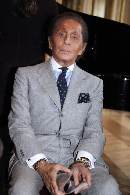 (FILES) Italian designer Valentino Garavani poses prior to be awarded with a medal of Commander of the Order of Arts and Letters by French Minister of Culture and Communication, on October 10, 2012 at the ministry of Culture in Paris. Italian designer Valentino Garavani has died at age 93, Italy's ANSA news agency reported on January 19, 2026.  The giant in the world of haute couture died at his home in Rome, the agency reported, citing the Valentino Garavani Foundation and the designer's longtime partner, Giancarlo Giammetti. (Photo by Bertrand GUAY / AFP)