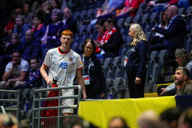 Czech Republic's left back #49 Daniel Blaha leaves the pictch after receiving a red card during the men's EHF Euro 2026 group C preliminary round handball match Czech Republic vs Ukraine in Oslo, Norway, on January 19, 2026. (Photo by Stian Lysberg Solum / NTB / AFP) / Norway OUT