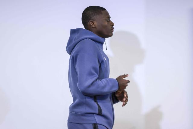 Paris SG’s Portuguese defender #25 Nuno Mendes arrives for a press conference on the eve of the UEFA Champions League league phase day 7 football match between Sporting CP and Paris SG at Alvalade stadium in Lisbon, on January 19, 2026. (Photo by PATRICIA DE MELO MOREIRA / AFP)