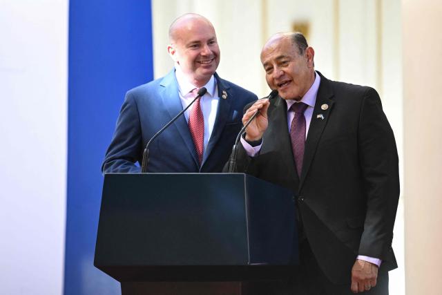 U.S. Senator Mike Lee (L) and Congressman Lou Correa speak during the First National Prayer Breakfast for El Salvador at the National Palace in San Salvador on January 19, 2026. (Photo by Marvin RECINOS / AFP)