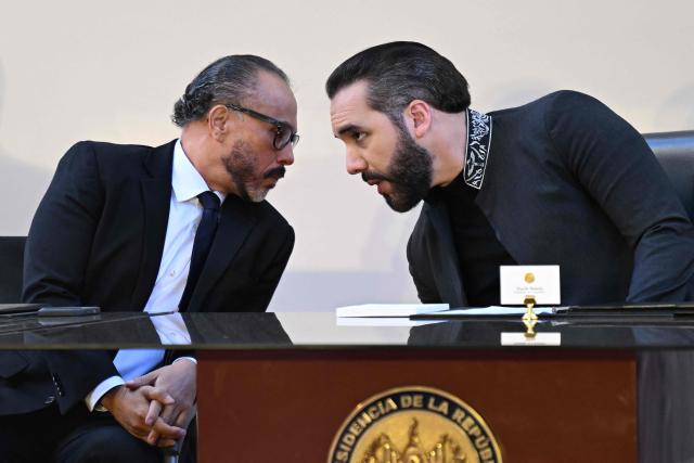 El Salvador’s President Nayib Bukele (R) speks with President of El Salvador’s Legislative Assembly, Ernesto Castro during the First National Prayer Breakfast for El Salvador at the National Palace in San Salvador on January 19, 2026. (Photo by Marvin RECINOS / AFP)