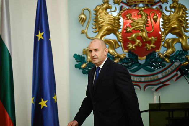 Bulgaria's President Rumen Radev leaves the press conference after announcing his resignation in Sofia on January 19, 2026. The Balkan country, which introduced the euro on January 1, was plunged into fresh political turmoil after a series of widespread anti-corruption protests swept a conservative-led government from office in mid-December. (Photo by Nikolay DOYCHINOV / AFP)