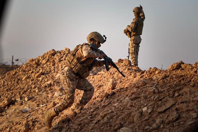 Saudi-backed Yemeni counter terrorism forces show their skills during an exhibition at Al Rayyan airport in the city of Mukalla in Yemen's coastal southern Hadramawt province on January 19, 2026. Saudi-backed Yemeni officials on January 19 said the United Arab Emirates has been running secret prisons in the country's south, the latest episode in a growing rift between the two regional allies turned rivals. The UAE and Saudi Arabia entered the Yemen war in 2015 as a united front backing the government against Iran-backed rebels. But they later supported rival factions within Yemen's internationally recognised government. A brief land grab by UAE-backed separatists infuriated Riyadh, which rolled them back. (Photo by FADEL SENNA / AFP)