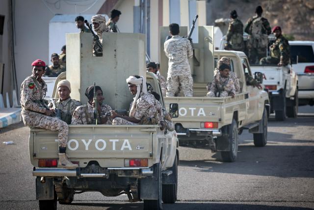 This photo taken on January 19, 2026 shows Saudi-backed Yemeni forces in the city of Mukalla in Yemen's coastal southern Hadramawt province. Saudi-backed Yemeni officials on January 19 said the United Arab Emirates has been running secret prisons in the country's south, the latest episode in a growing rift between the two regional allies turned rivals. The UAE and Saudi Arabia entered the Yemen war in 2015 as a united front backing the government against Iran-backed rebels. But they later supported rival factions within Yemen's internationally recognised government. A brief land grab by UAE-backed separatists infuriated Riyadh, which rolled them back. (Photo by FADEL SENNA / AFP)