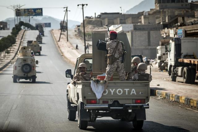 This photo taken on January 19, 2026 shows Saudi-backed Yemeni forces in the city of Mukalla in Yemen's coastal southern Hadramawt province. Saudi-backed Yemeni officials on January 19 said the United Arab Emirates has been running secret prisons in the country's south, the latest episode in a growing rift between the two regional allies turned rivals. The UAE and Saudi Arabia entered the Yemen war in 2015 as a united front backing the government against Iran-backed rebels. But they later supported rival factions within Yemen's internationally recognised government. A brief land grab by UAE-backed separatists infuriated Riyadh, which rolled them back. (Photo by FADEL SENNA / AFP)