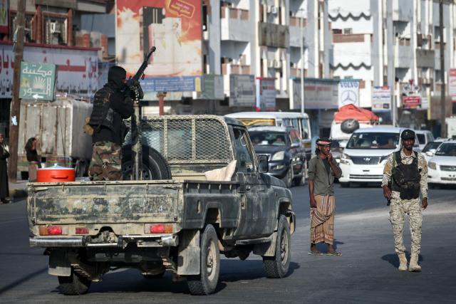 This photo taken on January 19, 2026 shows Saudi-backed Yemeni forces in the city of Mukalla in Yemen's coastal southern Hadramawt province. Saudi-backed Yemeni officials on January 19 said the United Arab Emirates has been running secret prisons in the country's south, the latest episode in a growing rift between the two regional allies turned rivals. The UAE and Saudi Arabia entered the Yemen war in 2015 as a united front backing the government against Iran-backed rebels. But they later supported rival factions within Yemen's internationally recognised government. A brief land grab by UAE-backed separatists infuriated Riyadh, which rolled them back. (Photo by FADEL SENNA / AFP)