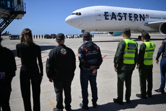 An Eastern Airlines plane carrying Venezuelan migrants deported from the United States lands at Simon Bolivar International Airport in Maiquetia, Venezuela on January 19, 2026. (Photo by Juan BARRETO / AFP)