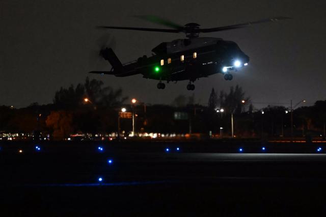 Marine One with US President Donald Trump aboard lands at North Perry Airport in Pembroke Pines to attend the College Football National Championship Game between the Miami Hurricanes and the Indiana Hoosiers at Hard Rock Stadium in Miami Gardens, Florida, on January 19, 2026. (Photo by ANDREW CABALLERO-REYNOLDS / AFP)