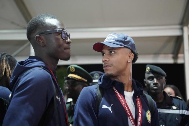 Members of Senegal’s national football team arrive in Dakar on January 20, 2025. Senegal’s national football team, crowned African Nations champion thanks to its victory over Morocco on Sunday in Rabat after a high-octane final, landed late Monday night back home, where it was warmly welcomed off the plane by the Senegalese head of state and his government.
The Lions of Teranga, who arrived on a special flight shortly before midnight local time and GMT from Morocco, were congratulated by Senegalese President Bassirou Diomaye Faye, Prime Minister Ousmane Sonko, and members of the government, an AFP journalist observed. (Photo by Carmen Abd Ali / AFP)