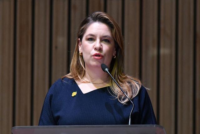 Costa Rica's presidential candidate of the Citizen Agenda Coalition and former first lady, Claudia Dobles, speaks during a debate at the University of Costa Rica in San Jose on January 19, 2026. Costa Rica will hold a presidential election on February 1, 2026. (Photo by EZEQUIEL BECERRA / AFP)
