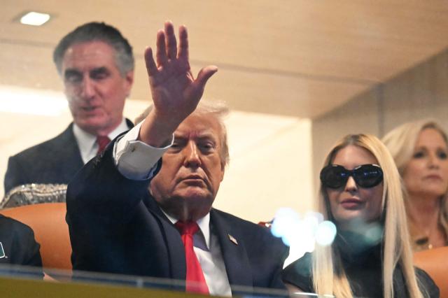 US President Donald Trump and his daughter Ivanka Trump attend the College Football National Championship Game between the Miami Hurricanes and the Indiana Hoosiers at Hard Rock Stadium in Miami Gardens, Florida, on January 19, 2026. (Photo by ANDREW CABALLERO-REYNOLDS / AFP)