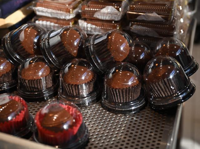 "Dubai-style" chewy chocolate cookies are displayed at a bakery cafe in Seoul on January 20, 2026. Chewy, crunchy and not-too-sweet -- chocolatey round "Dubai-style" cookies have become the must-have dessert in South Korea, with stocks running dry as customers queue as early as 6am for the confectionary. (Photo by Jung Yeon-je / AFP)