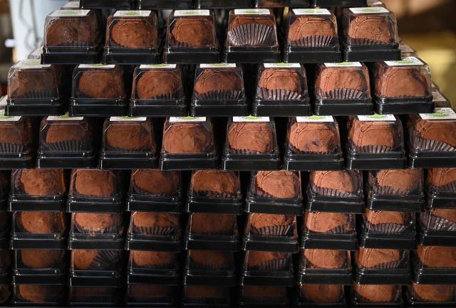 "Dubai-style" chewy chocolate cookies are displayed at a bakery cafe in Seoul on January 20, 2026. Chewy, crunchy and not-too-sweet -- chocolatey round "Dubai-style" cookies have become the must-have dessert in South Korea, with stocks running dry as customers queue as early as 6am for the confectionary. (Photo by Jung Yeon-je / AFP)