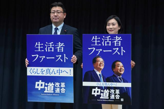 Representatives from Japan's new opposition party, the Centrist Reform Alliance, hold its political campaign posters at a press conference in Tokyo on January 20, 2025. Two Japanese opposition parties agreed to join forces to fight Prime Minister Sanae Takaichi's ruling coalition, forming an alliance seeking to draw swing voters in anticipated snap elections. (Photo by Kazuhiro NOGI / AFP)