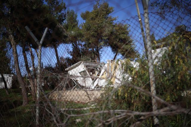 A photograph shows a demolished structure inside the headquarters of the United Nations Relief and Works Agency (UNRWA) in the Sheikh Jarrah neighbourhood of Israeli-annexed east Jerusalem on January 20, 2026. The chief of the UN's agency for Palestinian refugees denounced the Israeli authorities' seizure of assets from its east Jerusalem compound earlier this month, which police told AFP was part of a debt-collection operation. The compound in Israeli-annexed east Jerusalem has been empty of UNRWA staff since January, when the law banning its operations took effect after a months-long battle over its work in the Gaza Strip. Israel had accused UNRWA of providing cover for Hamas militants, and the legislation also forbids contact between the agency and Israeli officials. (Photo by ilia yefimovich / AFP)