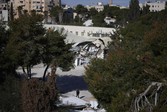 A photograph shows a demolished structure inside the headquarters of the United Nations Relief and Works Agency (UNRWA) in the Sheikh Jarrah neighbourhood of Israeli-annexed east Jerusalem on January 20, 2026. The chief of the UN's agency for Palestinian refugees denounced the Israeli authorities' seizure of assets from its east Jerusalem compound earlier this month, which police told AFP was part of a debt-collection operation. The compound in Israeli-annexed east Jerusalem has been empty of UNRWA staff since January, when the law banning its operations took effect after a months-long battle over its work in the Gaza Strip. Israel had accused UNRWA of providing cover for Hamas militants, and the legislation also forbids contact between the agency and Israeli officials. (Photo by ilia yefimovich / AFP)