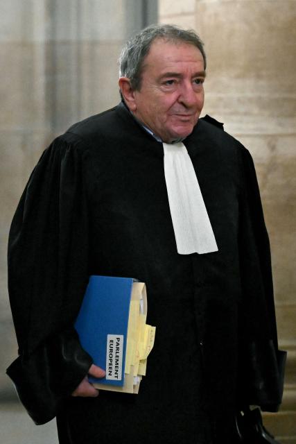 European parliament's lawyer Patrick Maisonneuve arrives for the hearing in the appeal trial of Rassemblement National (RN) parliamentary assistants on suspicion of embezzlement of European public funds at Paris courthouse in Paris on January 20, 2026. Marine Le Pen is called to the stand in the appeal trial in Paris of the parliamentary assistants of the National Front, where she is playing for her candidacy for the 2027 presidential election. Twelve of the accused, as well as the far-right party itself, have appealed against the verdict while another 12 people -- including one of Le Pen's sisters -- have decided to accept their convictions without appealing. (Photo by Bertrand GUAY / AFP)