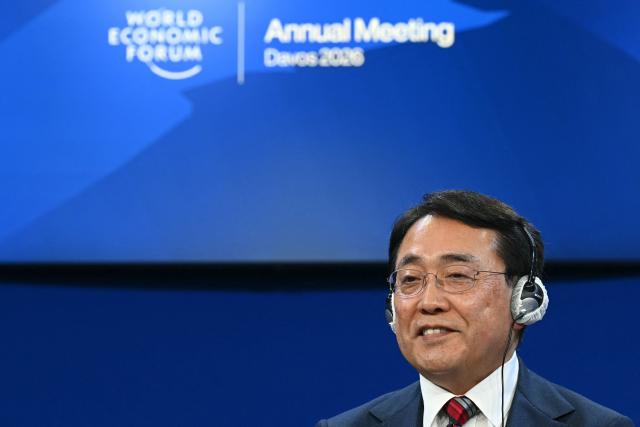 Japan's Minister of Economy, Trade and Industry Ryosei Akazawa reacts during the World Economic Forum (WEF) annual meeting in Davos on January 20, 2026. The World Economic Forum takes place in Davos from January 19 to January 23, 2026. (Photo by Fabrice COFFRINI / AFP)