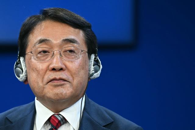 Japan's Minister of Economy, Trade and Industry Ryosei Akazawa looks on during the World Economic Forum (WEF) annual meeting in Davos on January 20, 2026. The World Economic Forum takes place in Davos from January 19 to January 23, 2026. (Photo by Fabrice COFFRINI / AFP)