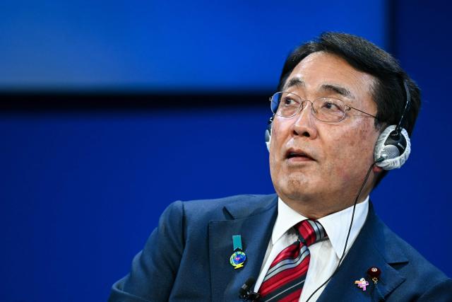 Japan's Minister of Economy, Trade and Industry Ryosei Akazawa reacts during the World Economic Forum (WEF) annual meeting in Davos on January 20, 2026. The World Economic Forum takes place in Davos from January 19 to January 23, 2026. (Photo by Fabrice COFFRINI / AFP)