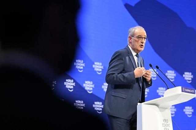 Switzerland's President Guy Parmelin delivers a speech during the World Economic Forum (WEF) annual meeting in Davos on January 20, 2026. The World Economic Forum takes place in Davos from January 19 to January 23, 2026. (Photo by Fabrice COFFRINI / AFP)
