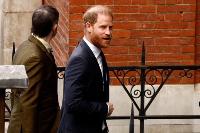 Britain's Prince Harry arrives outside the High Court in London on January 20, 2026, for the second day of the trial in his case against a major UK newspaper group. Prince Harry, pop icon Elton John and his husband David Furnish and four other high-profile figures are suing Associated Newspapers Ltd (ANL), the publisher of the Daily Mail and The Mail on Sunday, for privacy invasions. (Photo by Brook Mitchell / AFP)